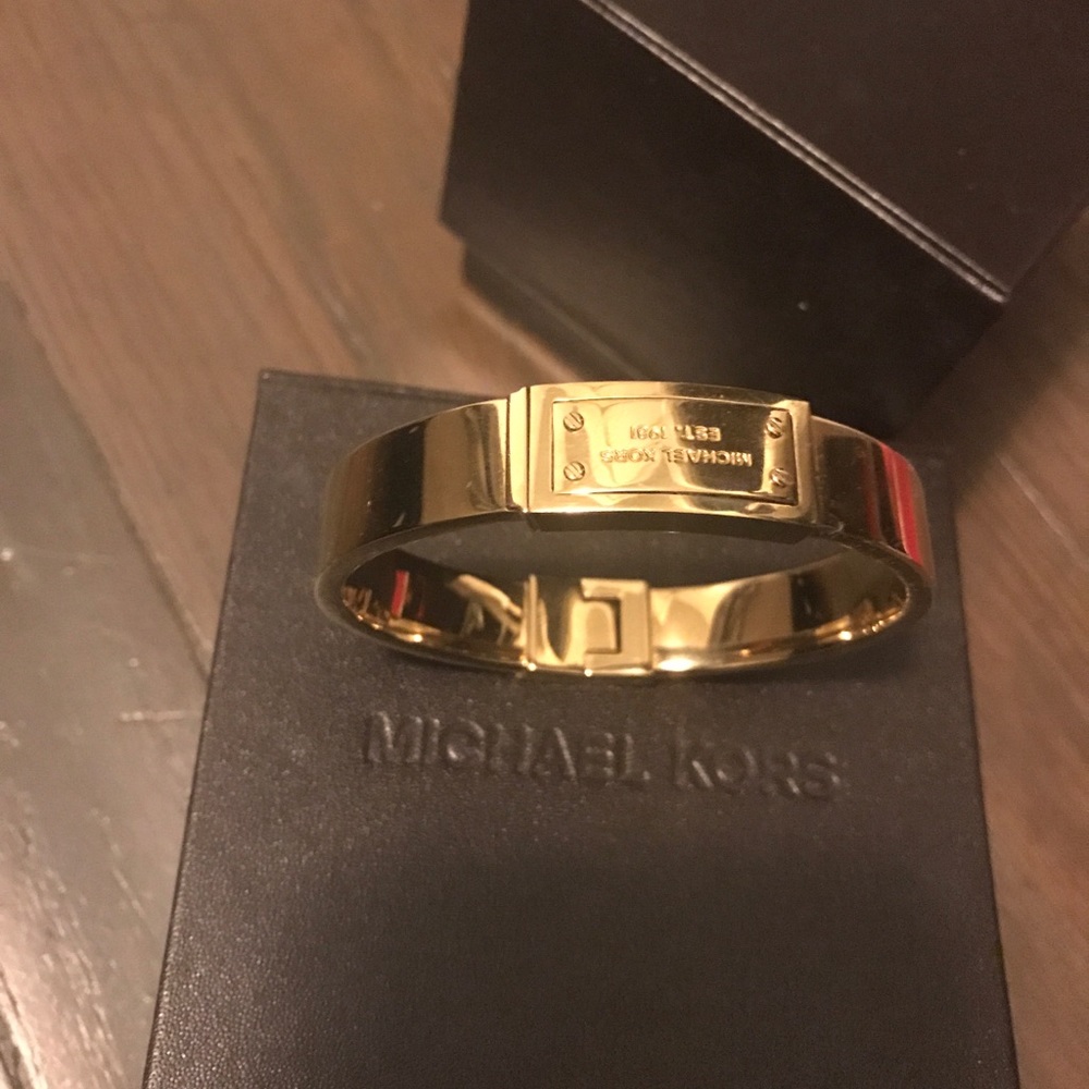 Micheal Kors gold tone bracelet